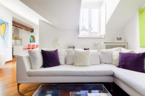 Stroll to the Duomo from a Plush Penthouse Apartment